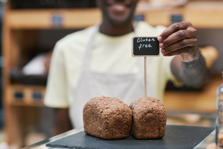 Baker Sticking Tag in Bread