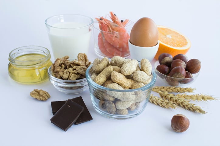 A group of major food allergens displayed on a table.