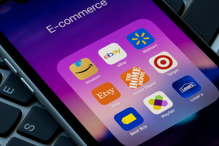 A mobile phone looking at the eCommerce app section which includes Walmart's app for shopping using their online Marketplace.