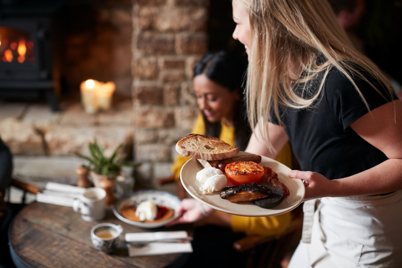 customers receiving food in a cafe