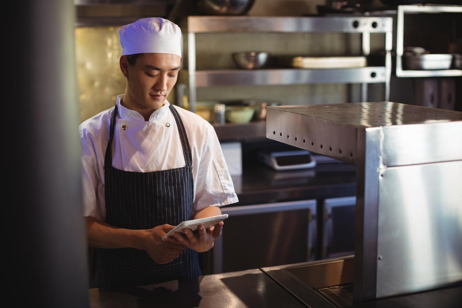 man looking at food safety guidelines