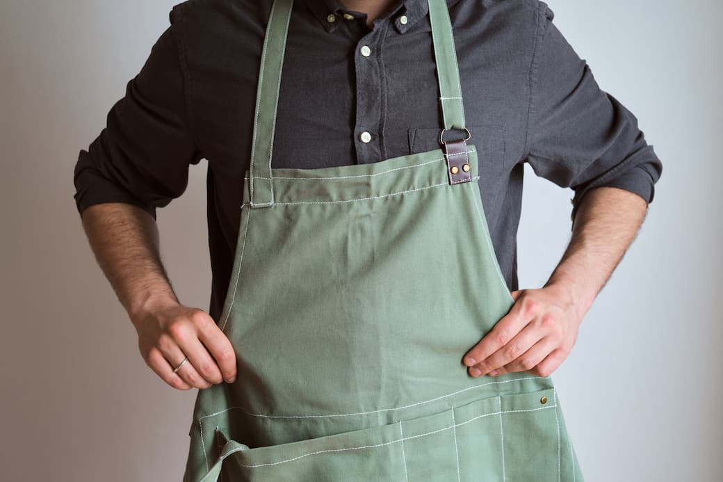 using an apron during food preparation
