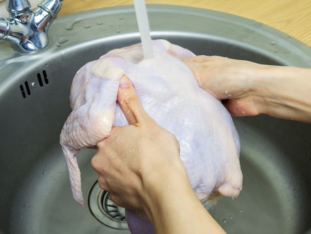 washing chicken